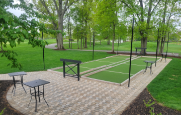 artificial turf bocce court in backyard of Ohio home