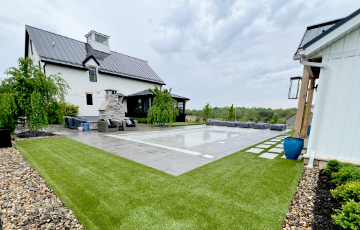 artificial grass lawn around pool of ohio home